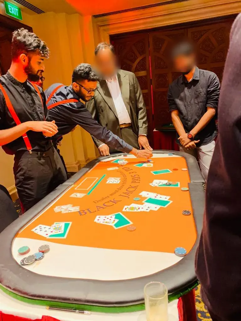 Dealers running a blackjack table at a corporate event