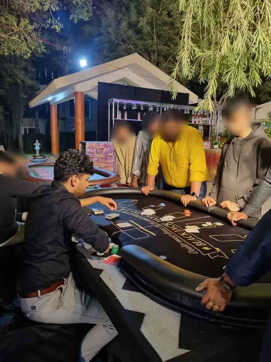 Guests playing blackjack at a Baazigar table