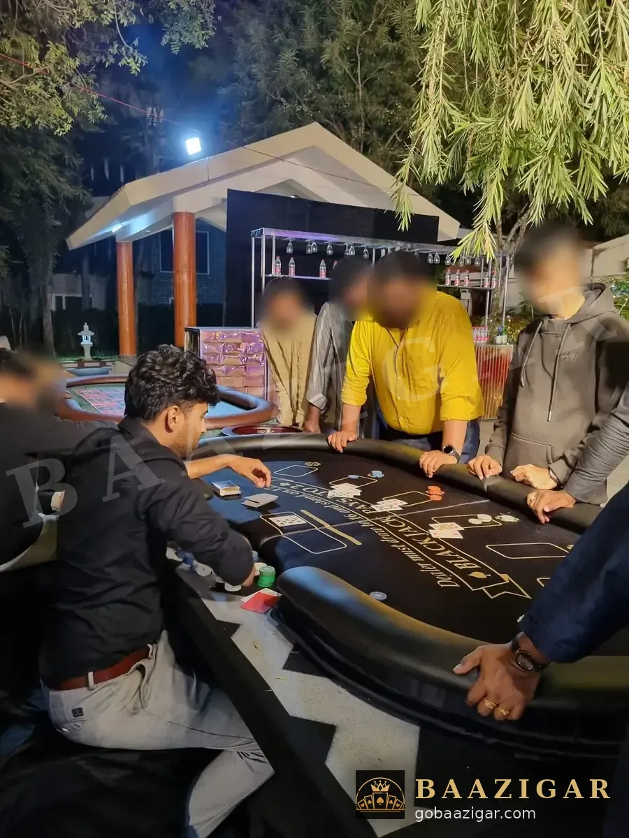 Guests playing blackjack at a Baazigar table