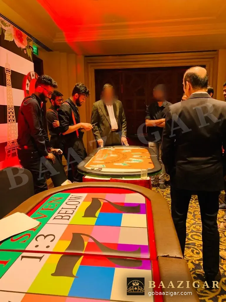 Casino floor with a Lucky 7 table and a blackjack table in play