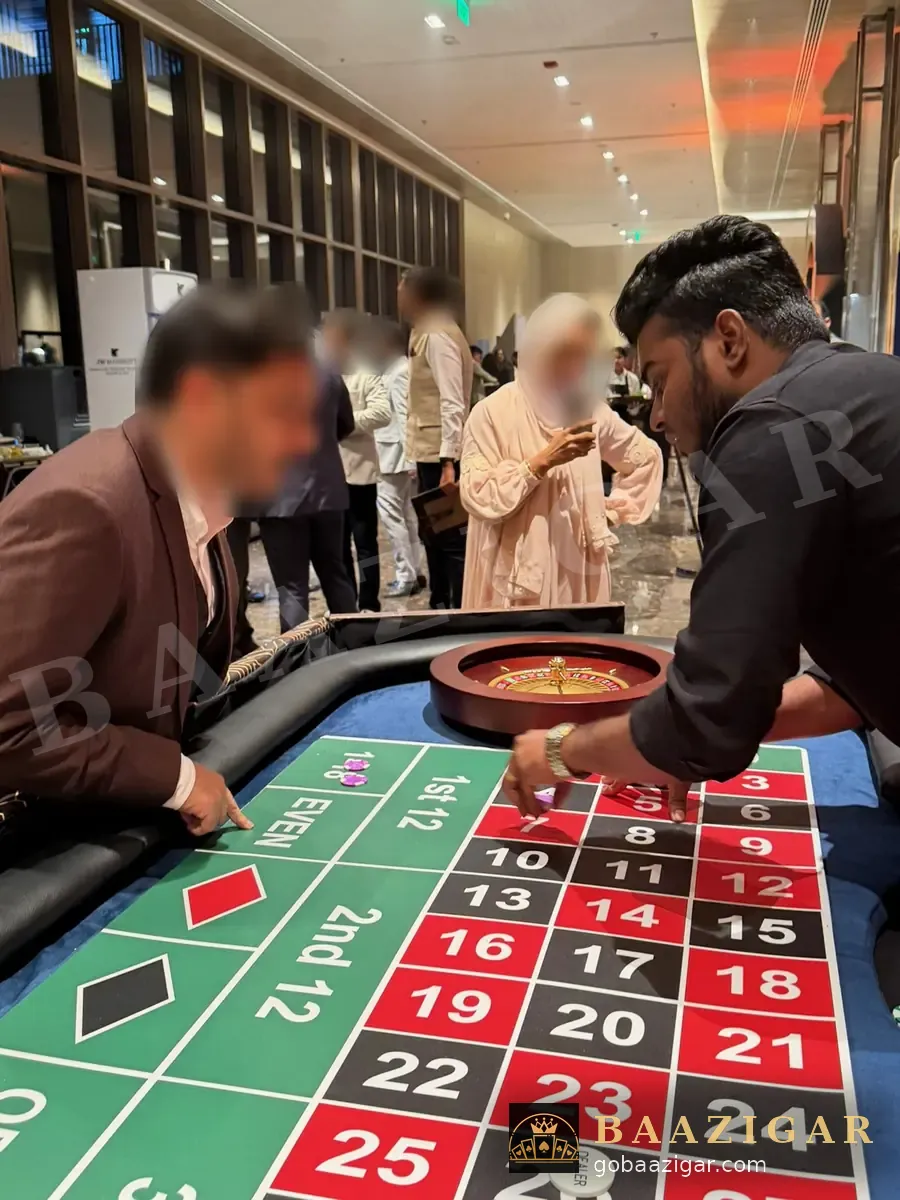 Dealer at a roulette table at a corporate evening