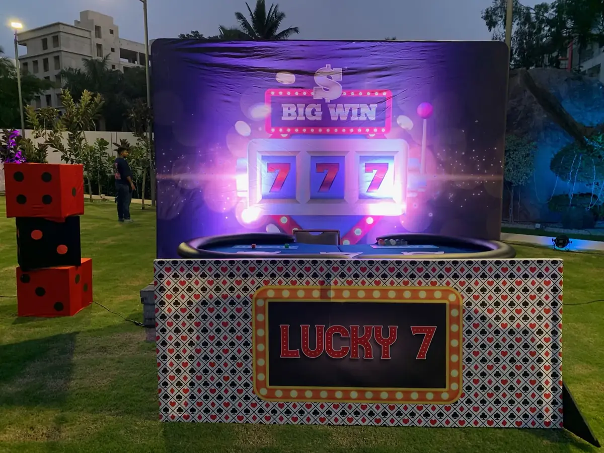 Lucky 7 station lit up at an evening corporate event