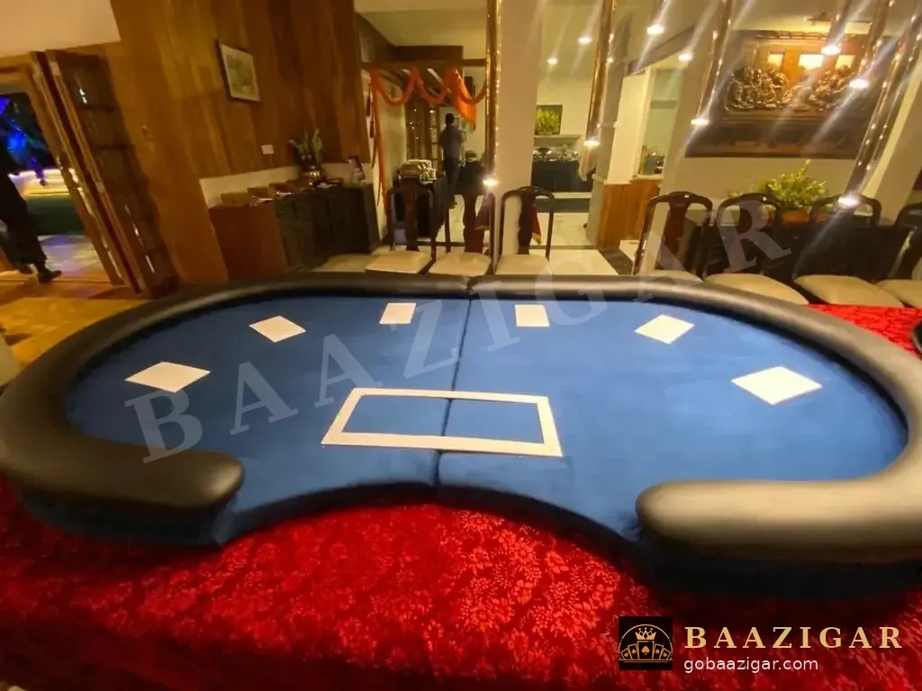 Blue poker table set up in a living room