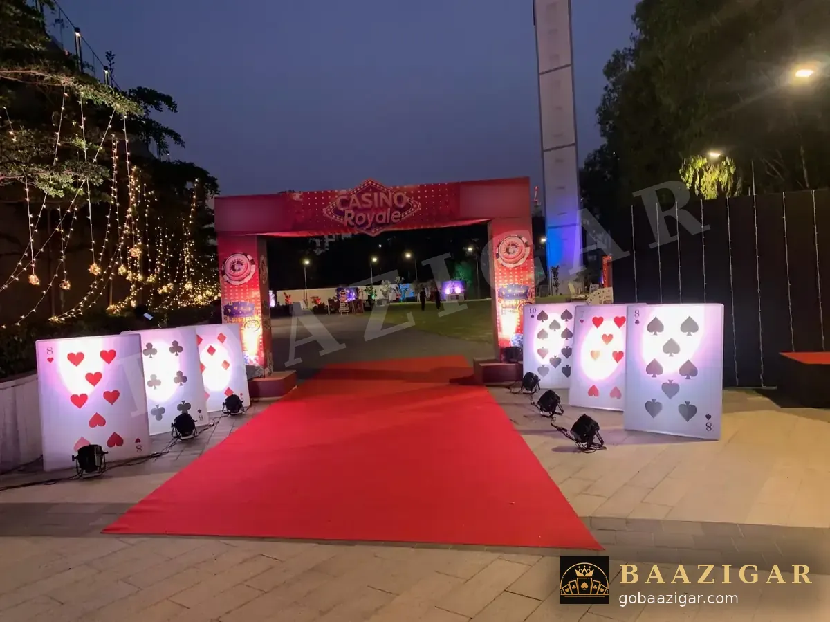 Red-carpet casino entrance with light-up card panels