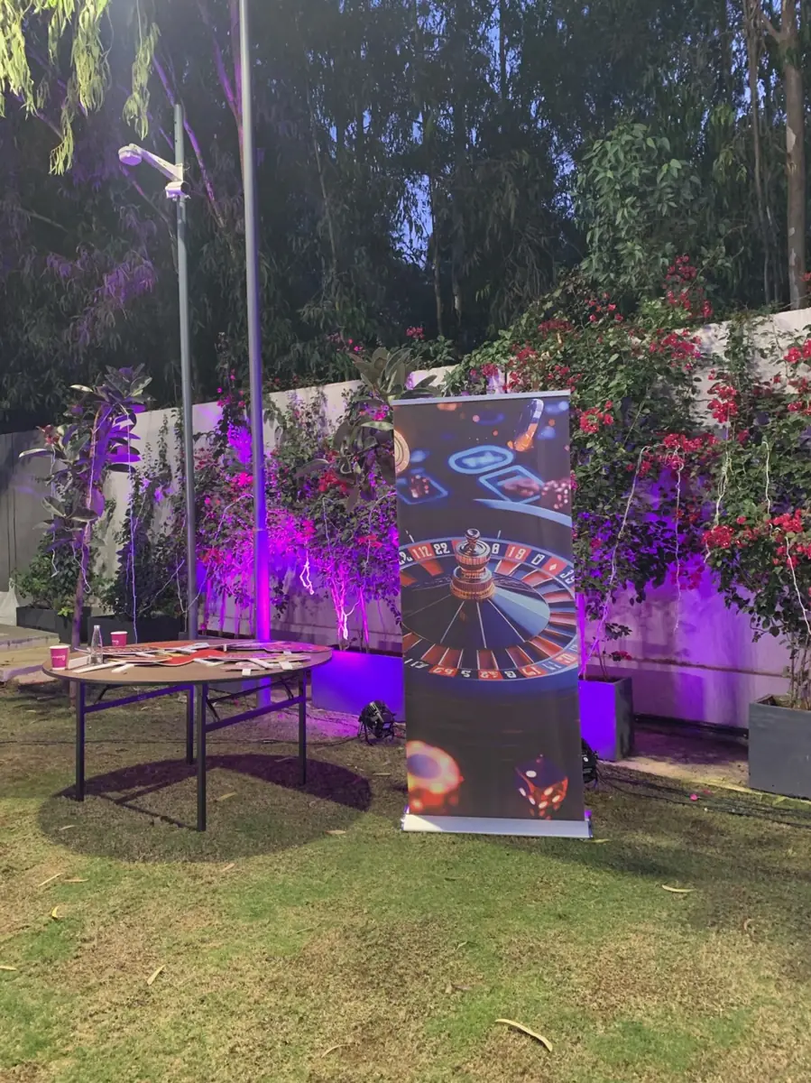 Roulette banner and tables at a night event