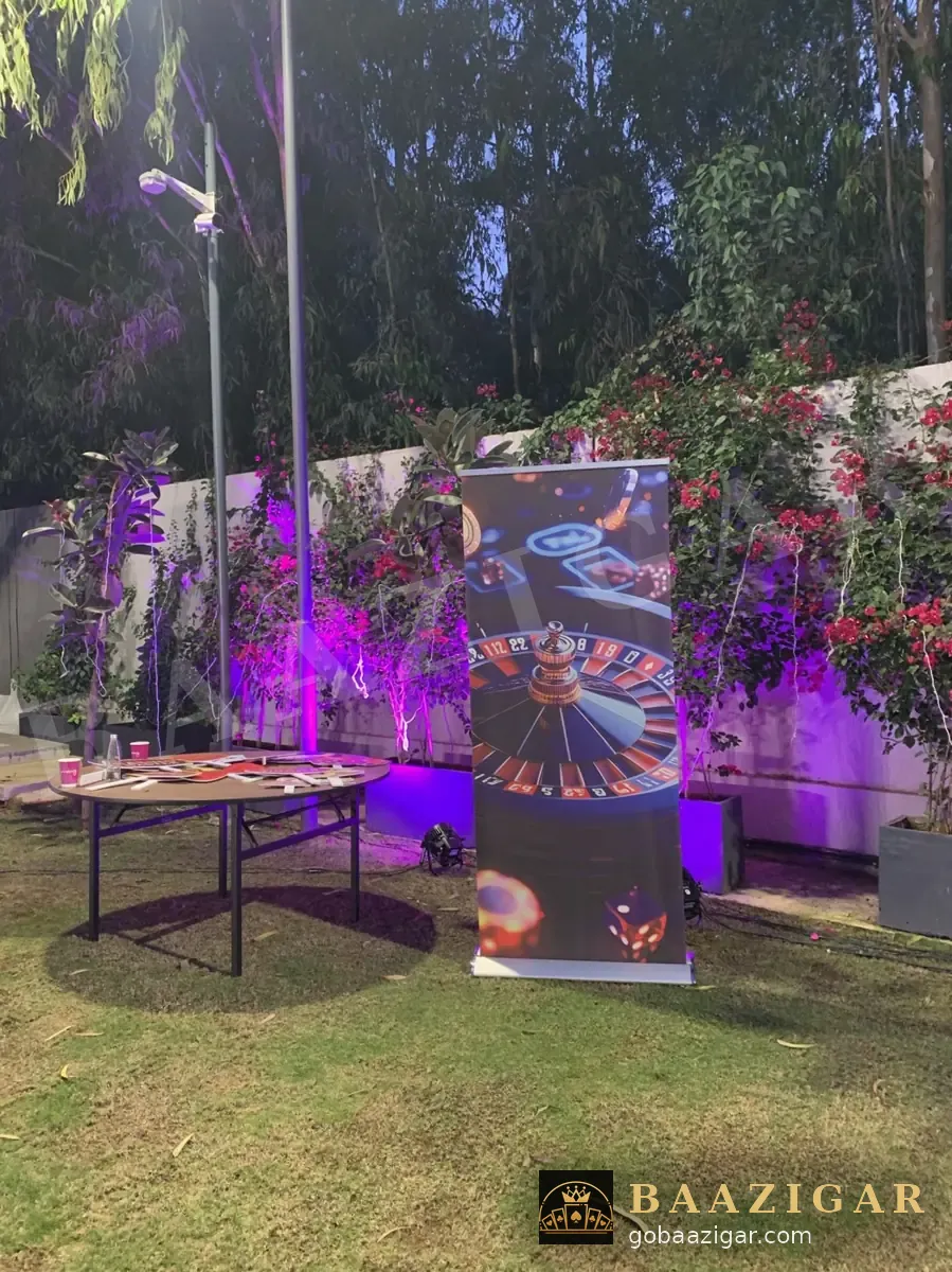 Roulette banner and tables at a night event