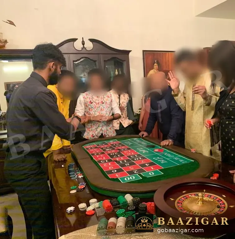 Guests around a roulette table with a dealer at a house party