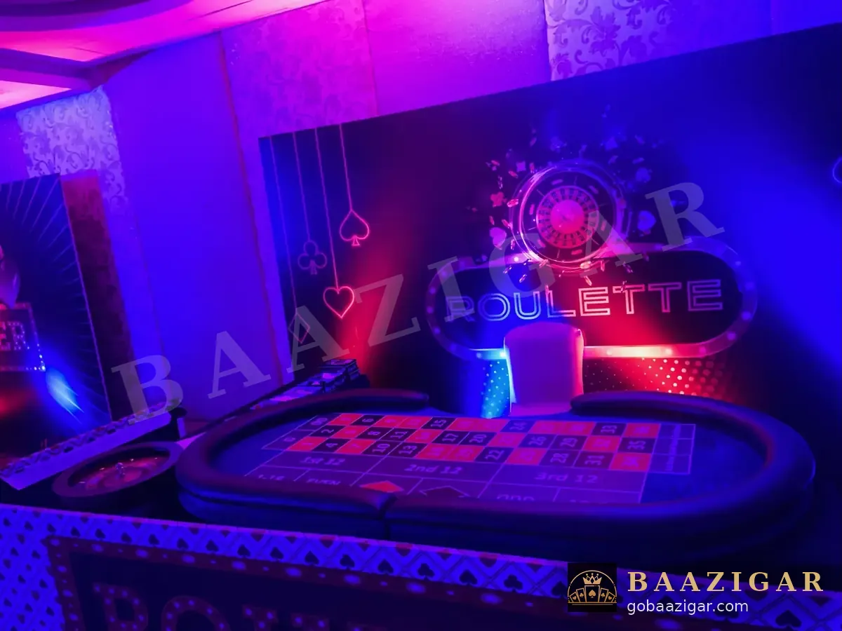 Roulette station glowing under party lights