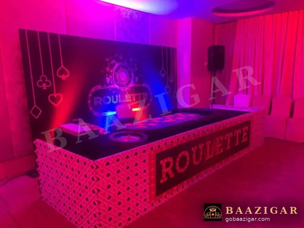 Roulette table under red and blue party lights