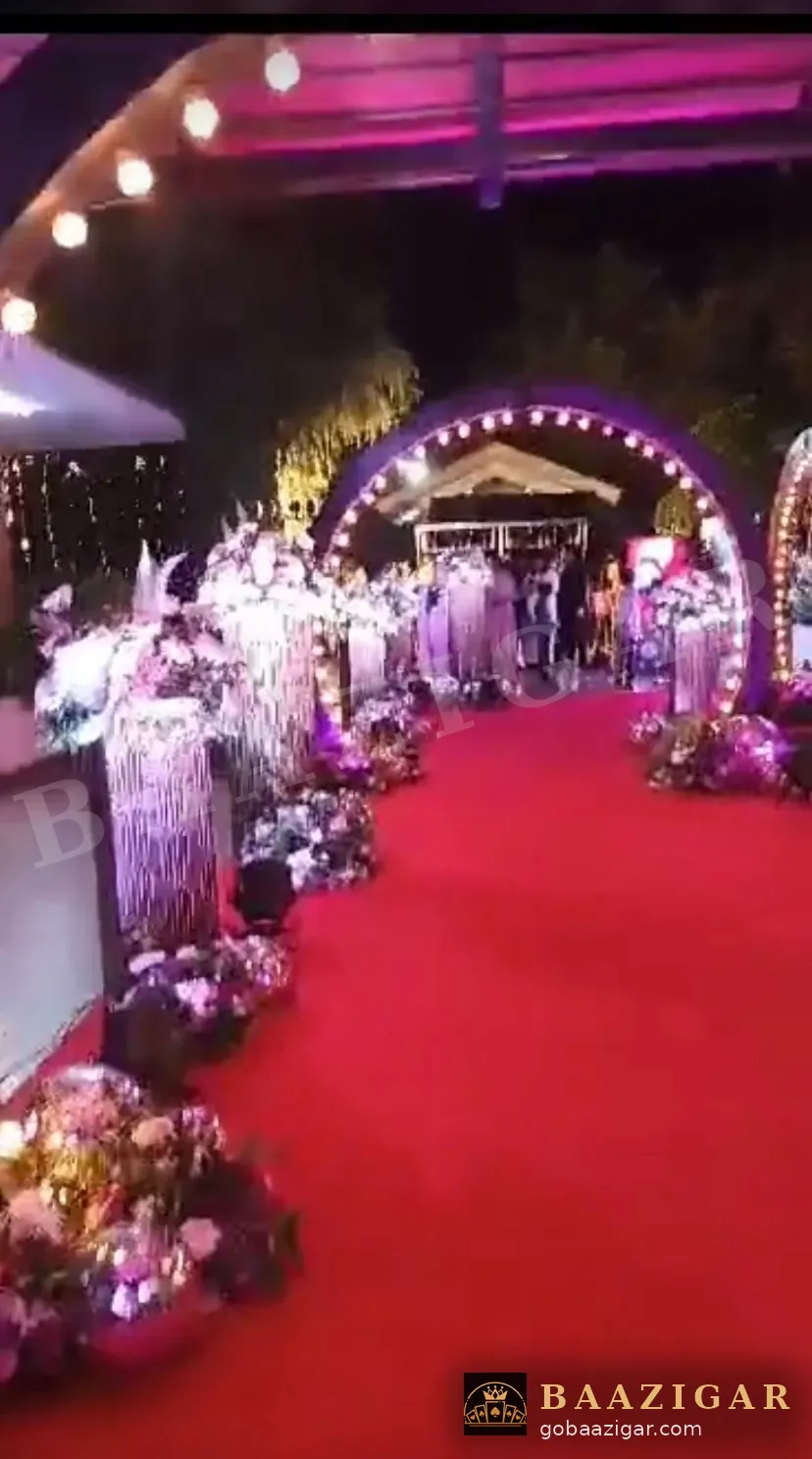 Floral walkway with a casino arch at a wedding